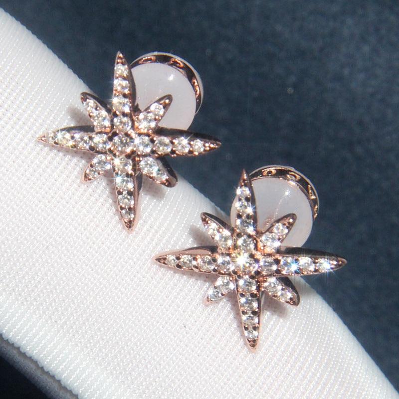 أقراط نجمة من الفضة مرصعة بالكريستال والألماسEarringsمجوهرات ميون