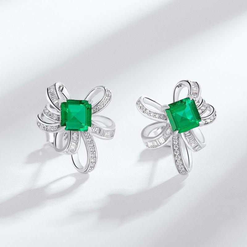 الأقراط الفضية من الزمرد الراقي شكل ربطة القوسEarringsمجوهرات ميون