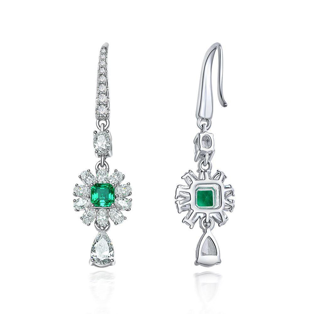 أقراط مرصعة بالألماس و الزمردEarringsمجوهرات ميون
