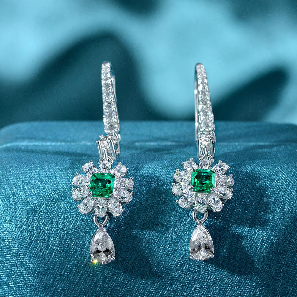أقراط مرصعة بالألماس و الزمردEarringsمجوهرات ميون