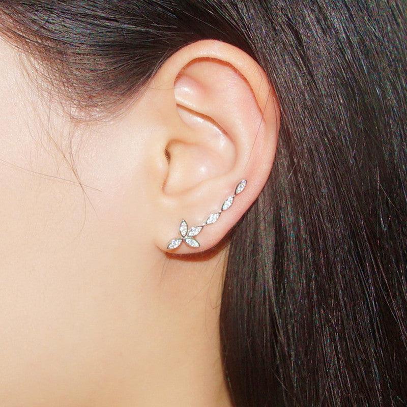 أقراط مرصعة بالماس على شكل زهرةEarringsمجوهرات ميون
