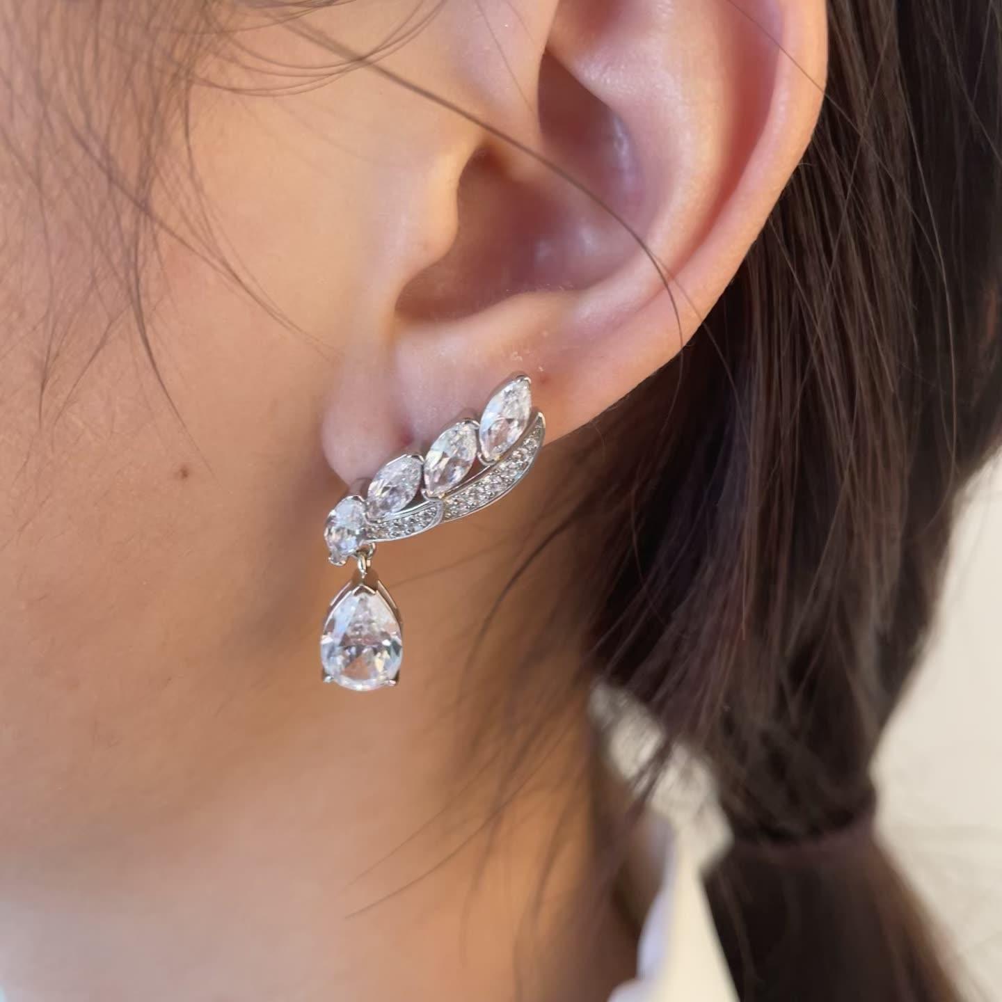 أقراط ألماس بتصميم الريشEarringsمجوهرات ميون