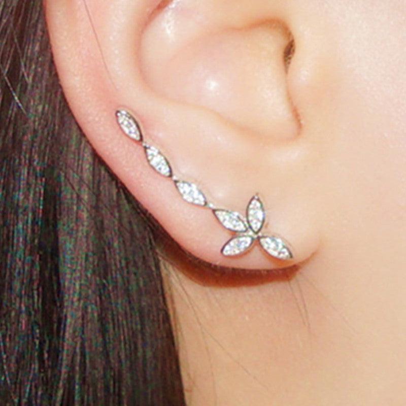 أقراط مرصعة بالماس على شكل زهرةEarringsمجوهرات ميون